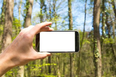 El üstünde tutan akıllı telefon