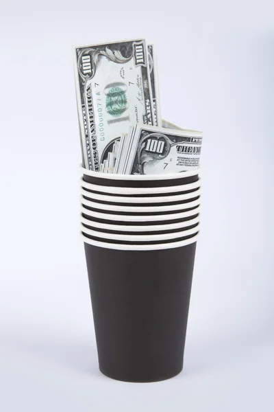 Fekete papír üveg pénzzel — Stock Fotó