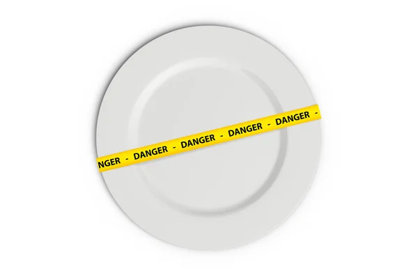 皿の上の危険テープ — ストック写真