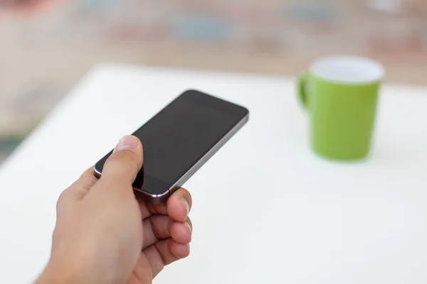 Teléfono inteligente a mano — Foto de Stock