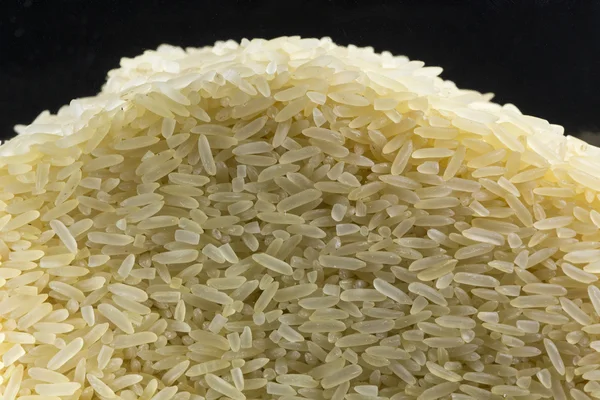 Grãos de arroz branco e amarelo close-up — Fotografia de Stock
