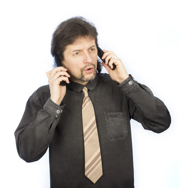 A young man talking on the phone Stock Image