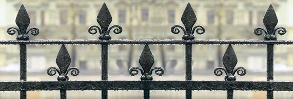 Black grille with patterns — Stock Photo, Image