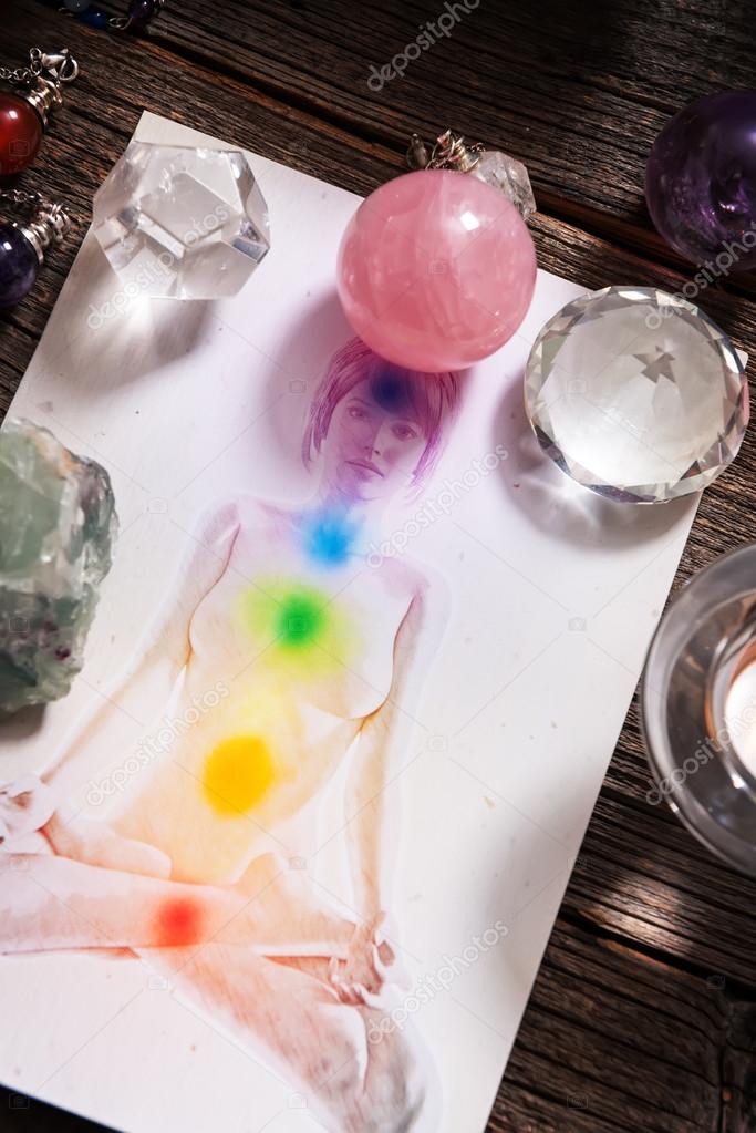 Chakras over a human body