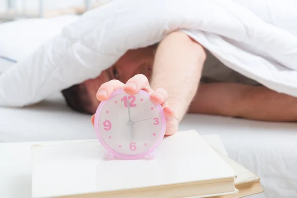 Hand on clock — Stock Photo, Image