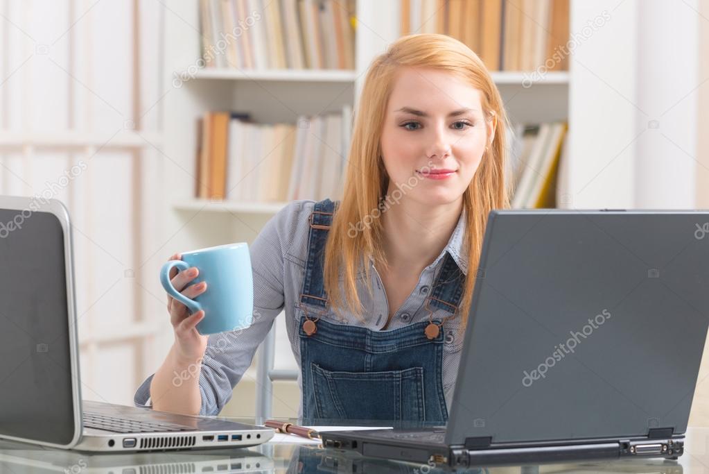 Young woman working with laptop