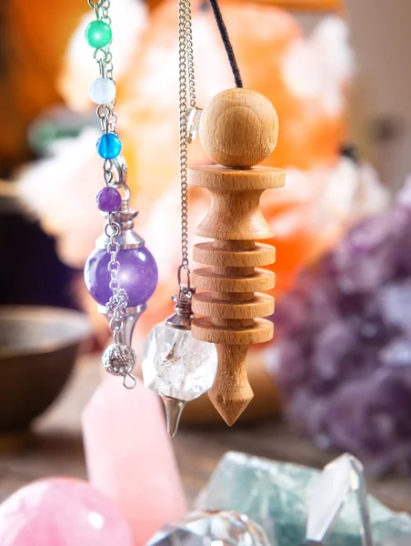 Pendulum and crystals — Stock Photo, Image