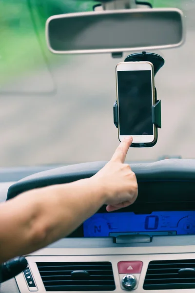 Hand touching screen on smart phone — Stock Photo, Image