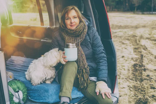 Woman Eating Hot Dish Thermos Road Trip Sitting Small Camper — Stock Photo, Image