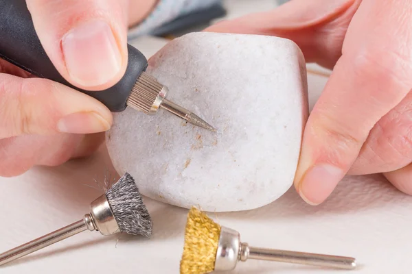 Engraving stone with rotary multi tool — Stock Photo, Image