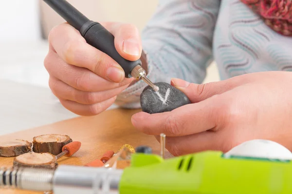 Engraving stone with rotary multi tool — Stock Photo, Image