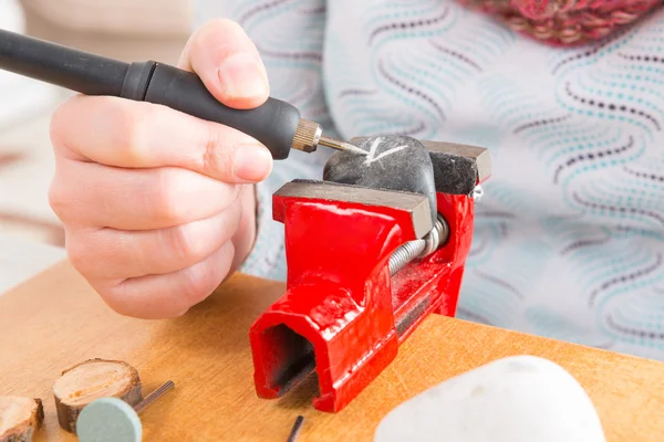 Engraving stone with rotary multi tool — Stock Photo, Image