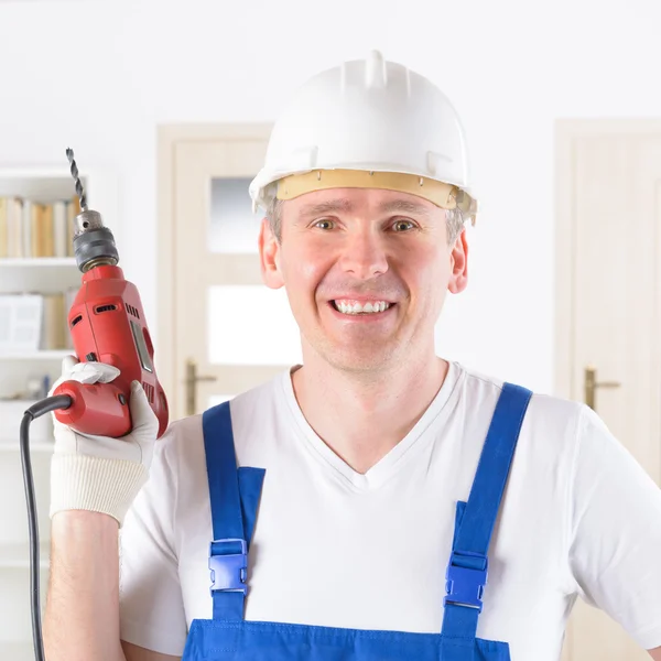Man with electric drill — Stock Photo, Image