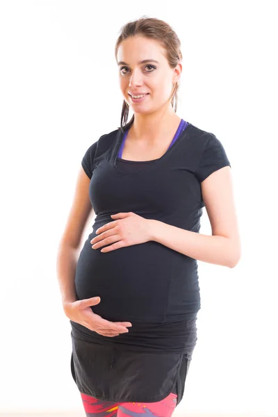Terhes nő felett fehér háttér — Stock Fotó
