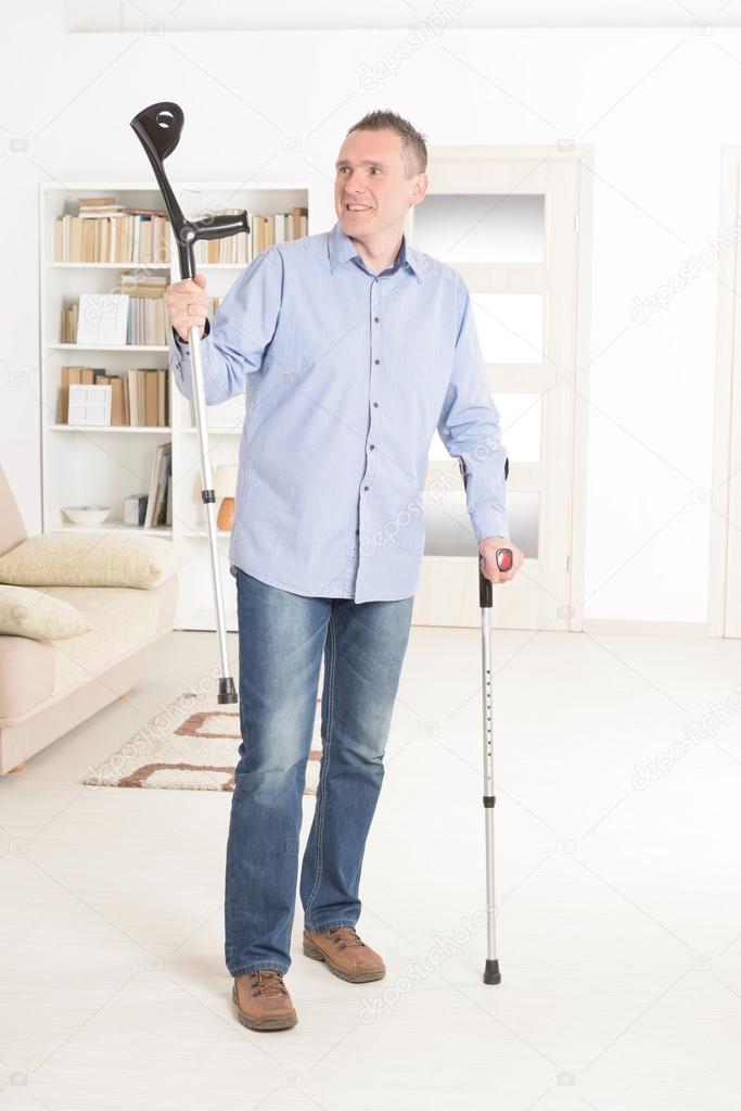 Man with crutches