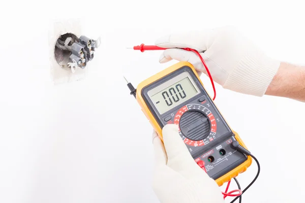 Electrician checking socket — Stock Photo, Image