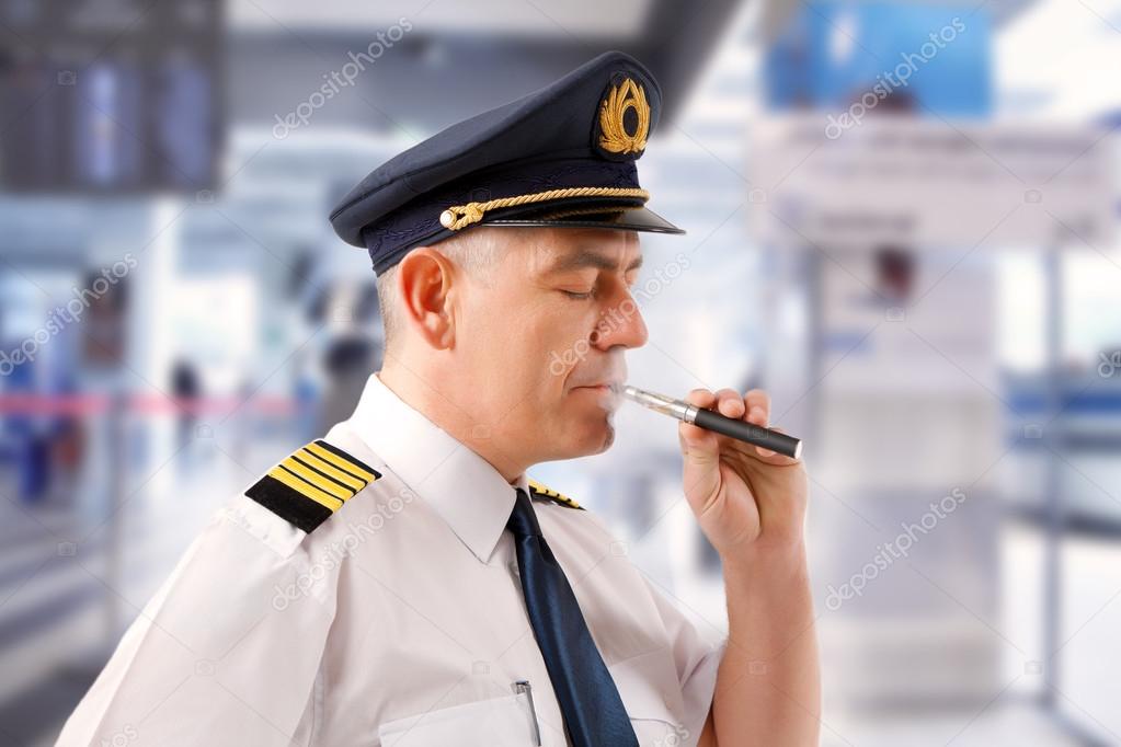 Airline pilot with e-cigarette