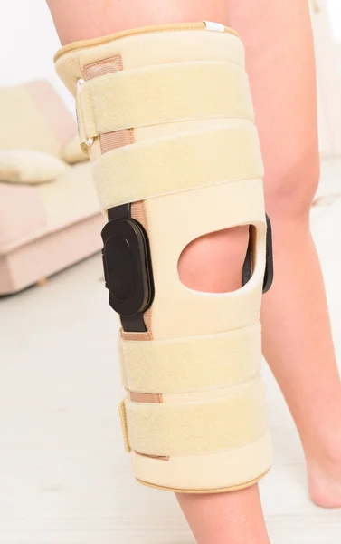 Leg in knee cages — Stock Photo, Image