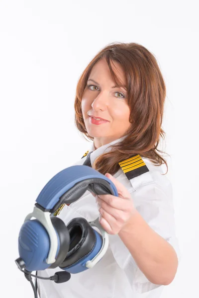 Woman airline pilot with headset — Stock Photo, Image