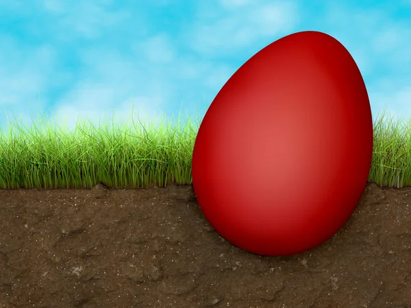 Velikonoční vajíčko na zemi s trávou — Stock fotografie