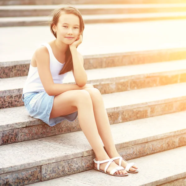 Girl on the stairs — Stock Photo, Image