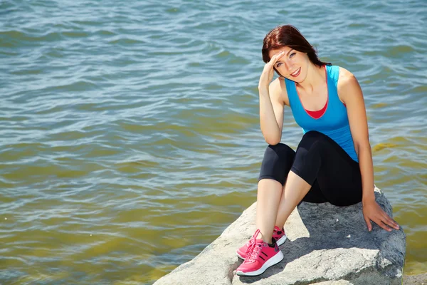 Sporty woman on the sea — Stock Photo, Image