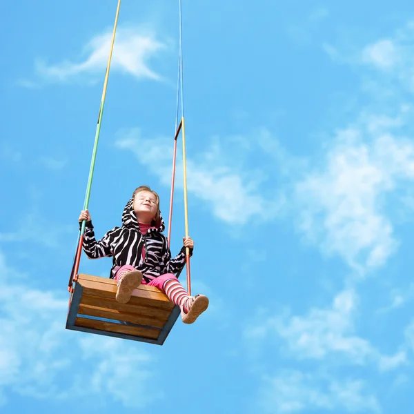 Girl on a swing — Stock Photo, Image