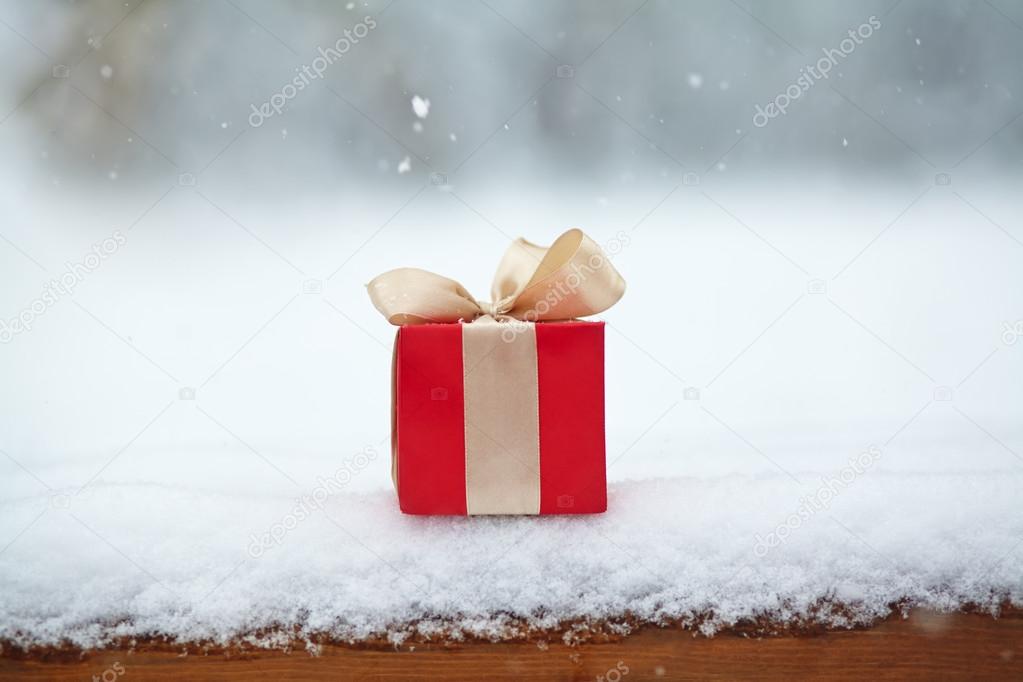 gift box in the snow outdoors