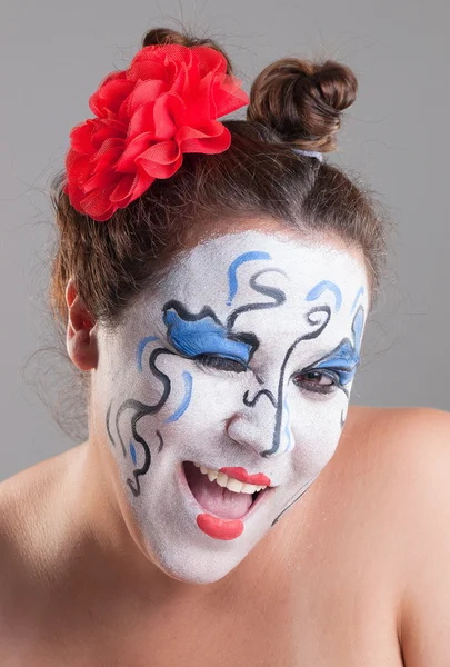 Vrouw met circus make-up — Stockfoto
