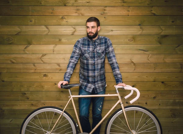 Hipster człowieka z jego rower fixie — Zdjęcie stockowe