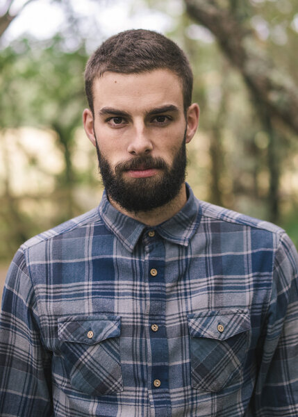 Hipster man portrait outdoors.