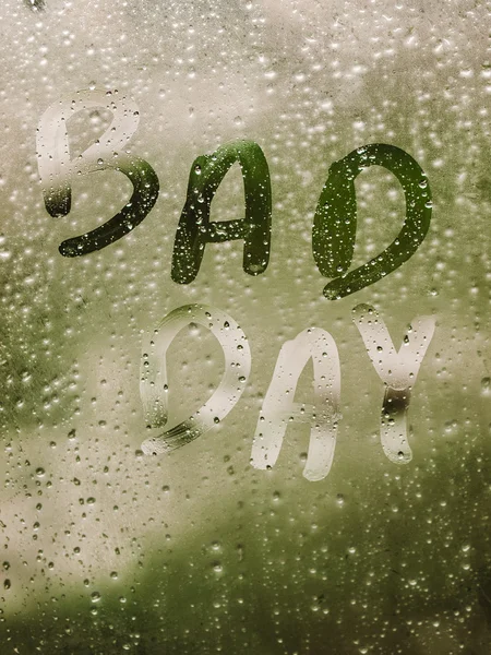 Text "BAD DAY" written in a crystal — Stock Photo, Image