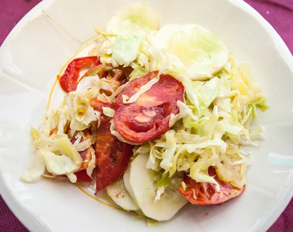 Mixed salad with head cabbage, tomatoes, cucumbers. — Stock Photo, Image