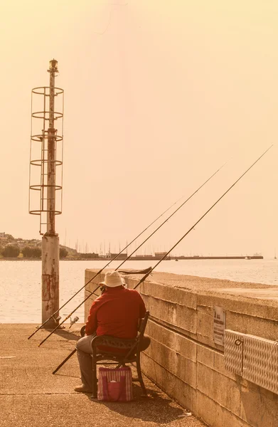 Muggia, pescatore uomo — Foto Stock