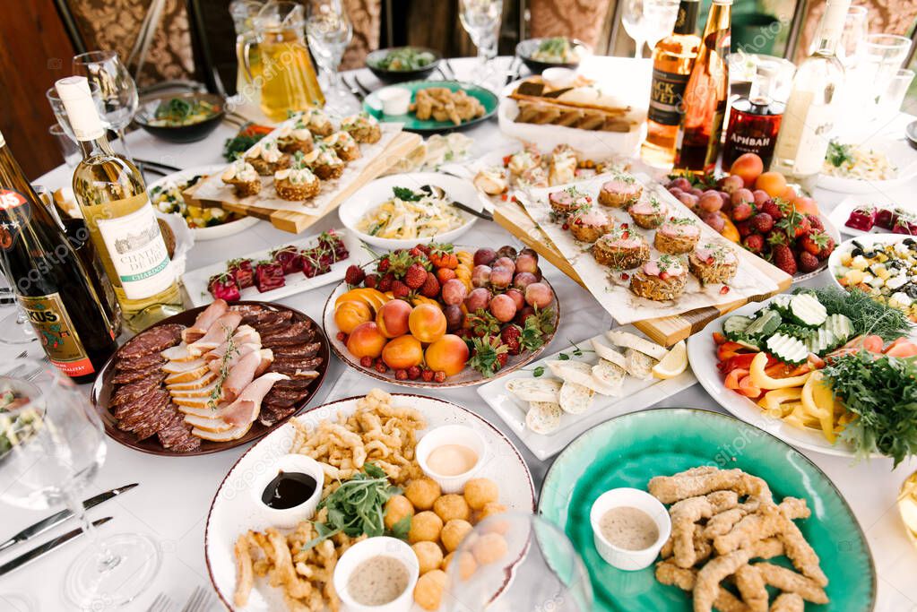 The Feast Of Round Table Full Delicious Food And Snacks A Beautiful Setting Catering Holiday In Fresh Air 452028934 Larastock Catering Holiday In The Fresh Air, Food For A Buffet Table