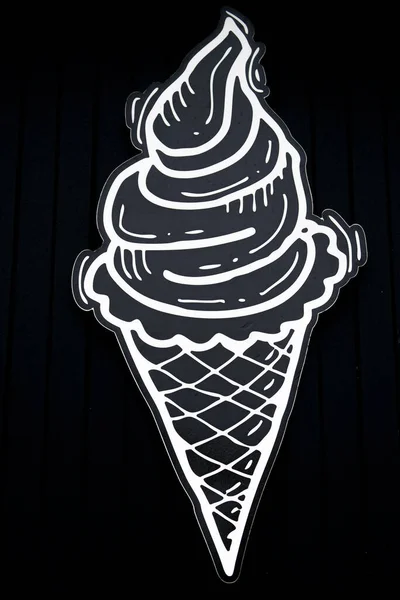 Icons of fast food drawings on a black background, ice cream