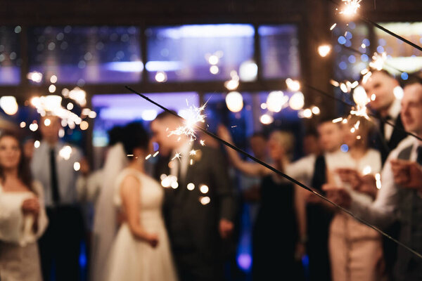 Sparklers at night wedding ceremony