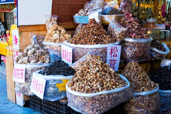 Different mushrooms in a food shop, Shuzheng Tibetan village, Jiuzhaigou National Park, Sichuan Province, China, Asia