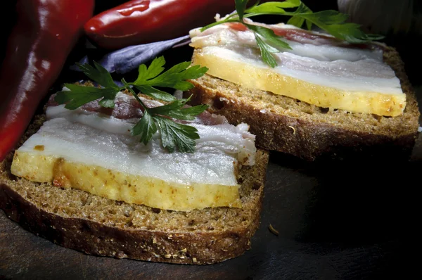 Sandwich with salted lard, garlic and pepper — Stock Photo, Image