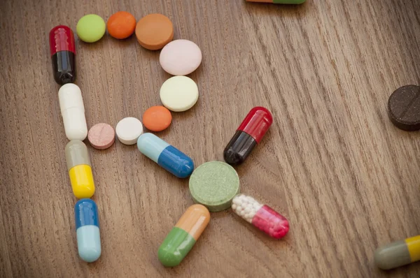 Símbolo de prescrição Rx feito de drogas — Fotografia de Stock