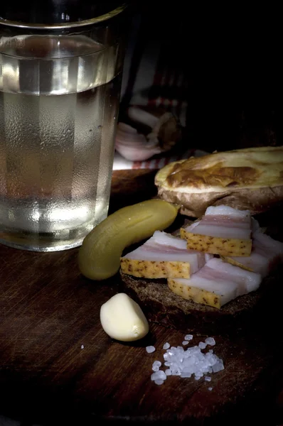 Sandwich with salted lard and vodka — Stock Photo, Image