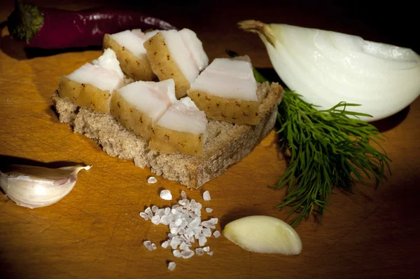 Сэндвич с соленым салом, легкая кисть — стоковое фото