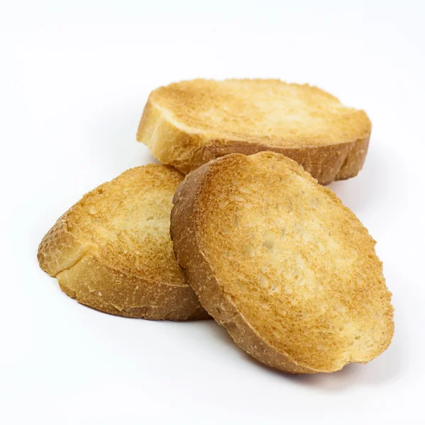 Pane tostato croccante su bianco — Foto Stock