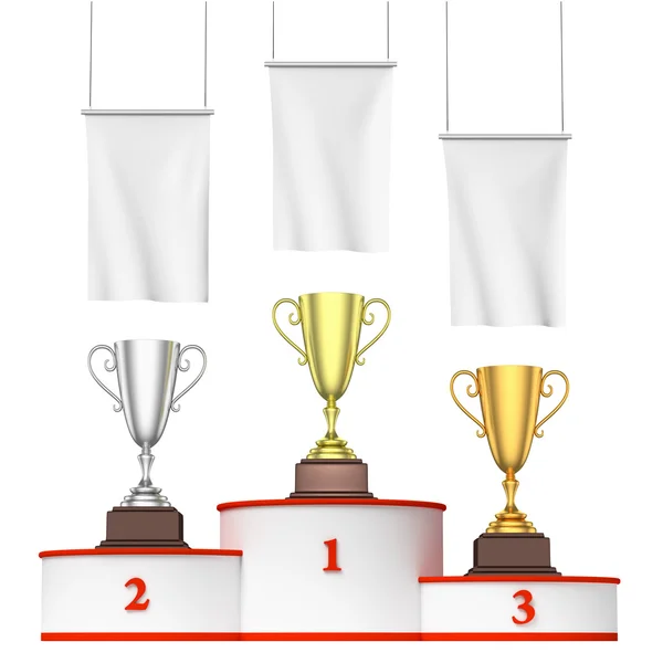 Round winners podium with trophy cups and blank white flags — Stock Photo, Image
