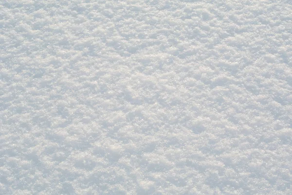 Superficie Nieve Con Copos Nieve Brillantes Bajo Brillante Luz Del — Foto de Stock