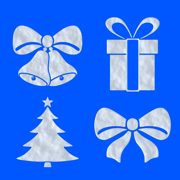 Kerst objecten iconen gemaakt van sneeuw op de blauwe reeks — Stockfoto