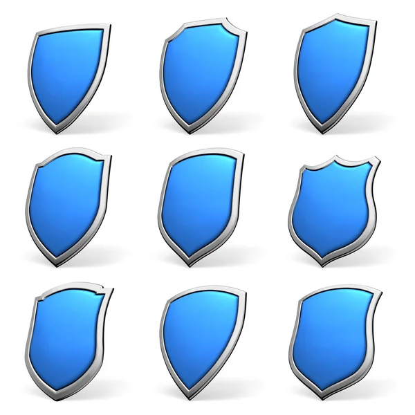 Голубые щиты на белый комплект — стоковое фото