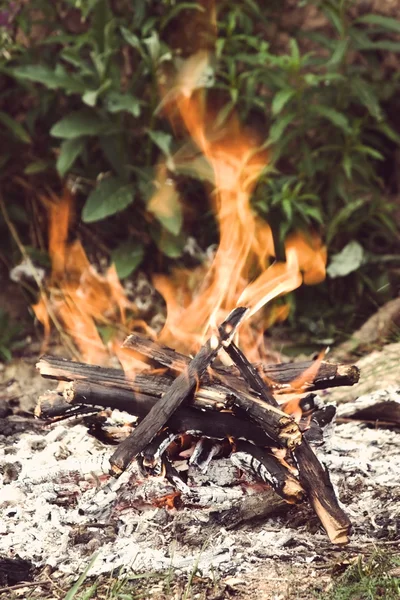 Camping bonfire close-up view with Instagram style filter — Stok Foto