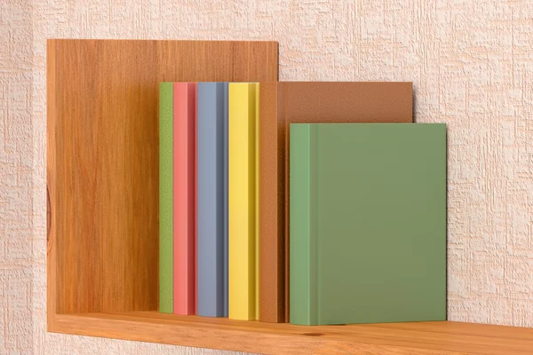 在墙上的木书架上的彩色的书 — 图库照片