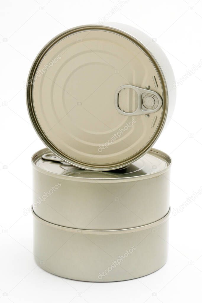 Metal cans of ready-made food in canned form on isolated white backgroun
